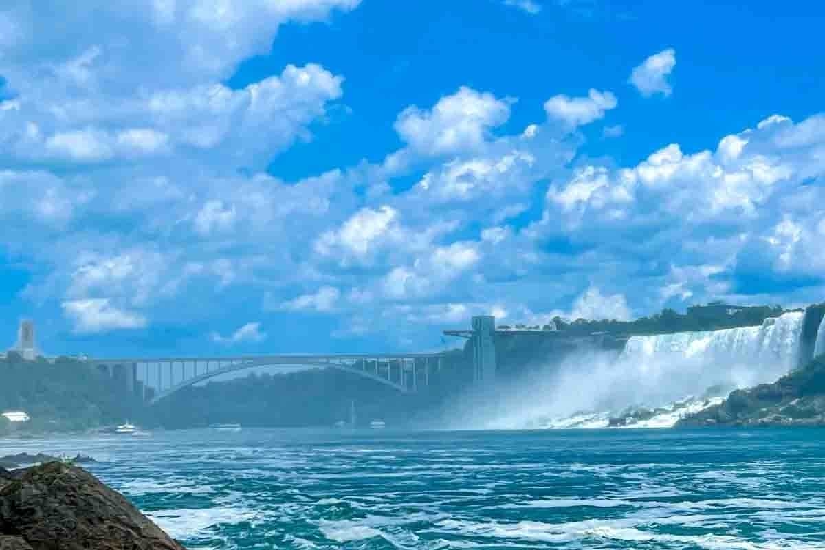 A distant view of a large waterfall.