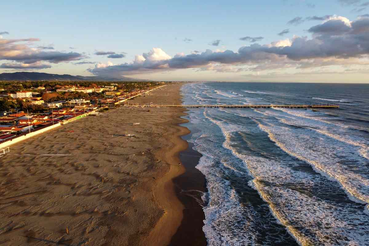 Aerial view of a long sandy beach.